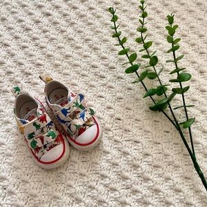 Converse multicolored dinosaur print sneakers